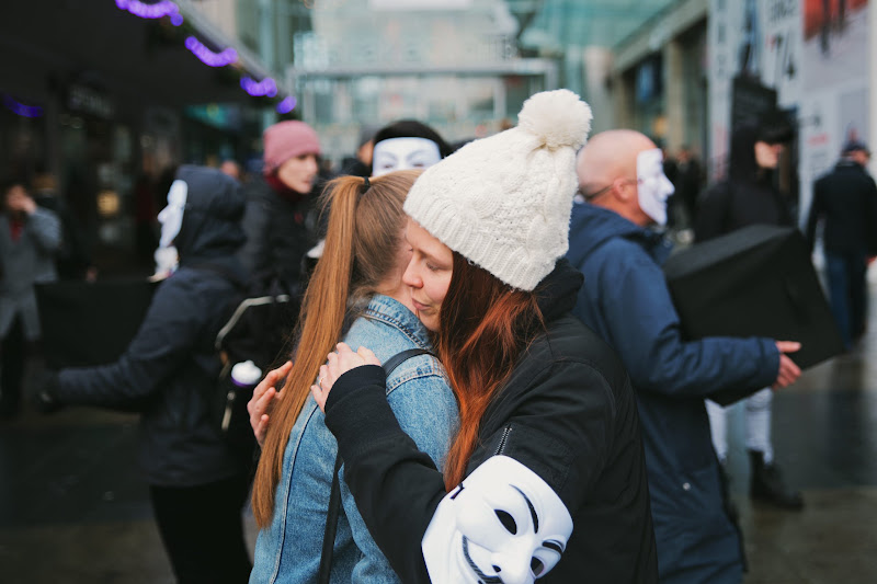 Actvist Embraces Crying Girl at AV Cube Of Truth