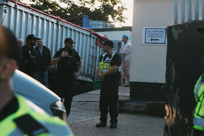 Police & Slaughterman At Slaughterhouse Protest