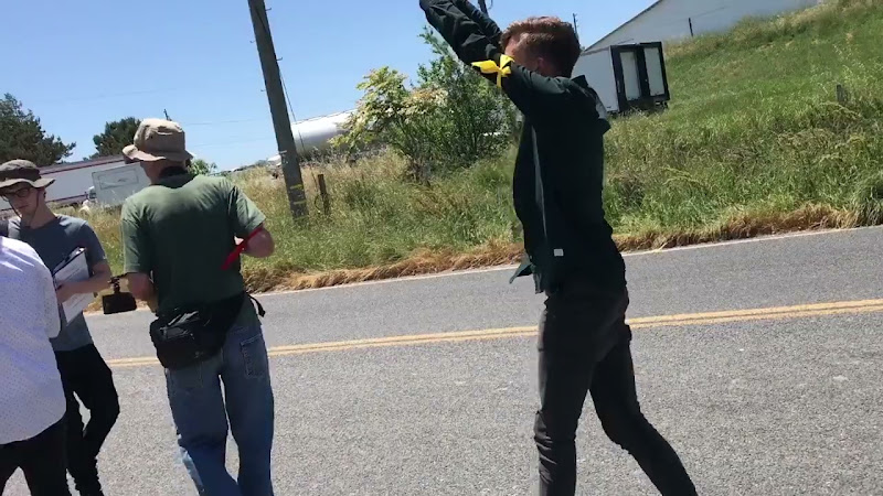 DXE Activists Carrying Rescued Chickens